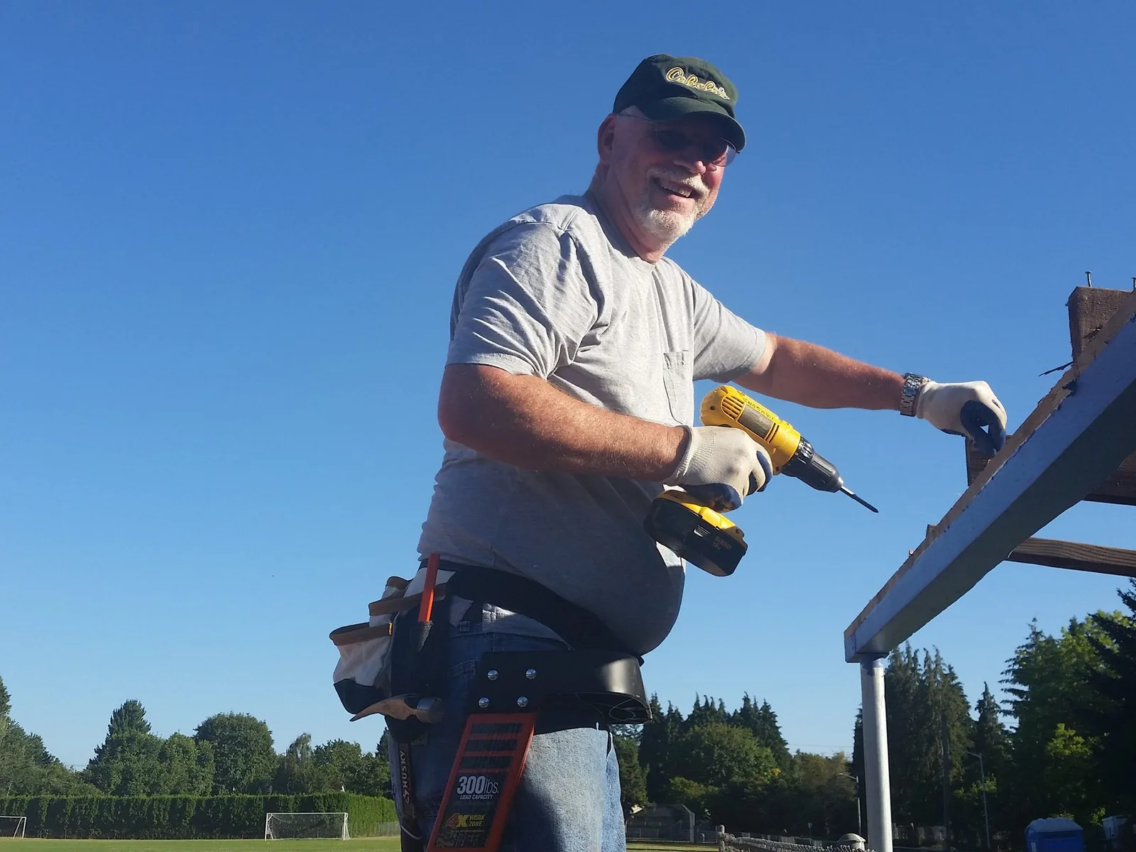 M.A.K. member building dugouts at Bob Parsons field