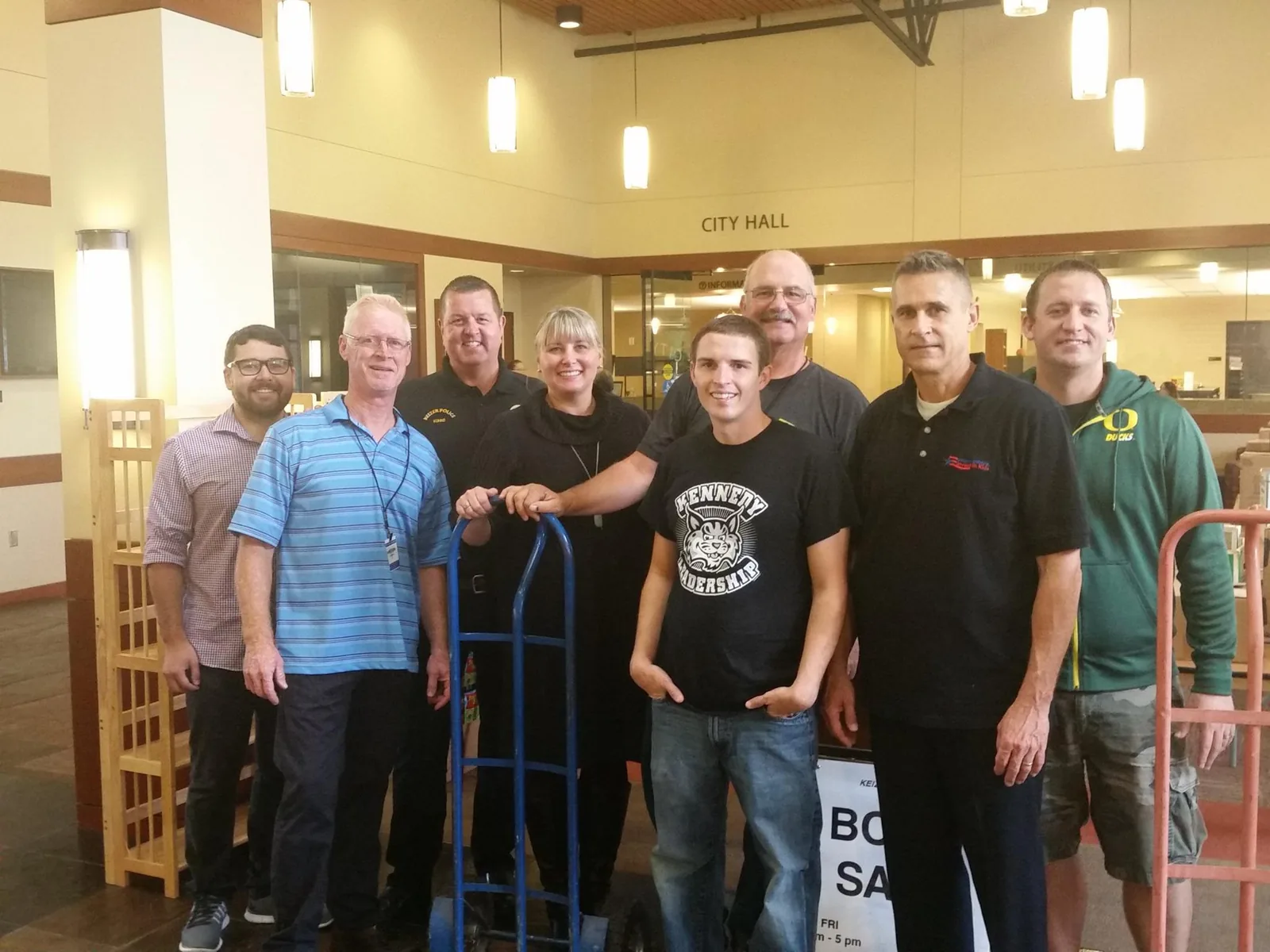 M.A.K. volunteers with hand carts moving into the new Keizer Library
