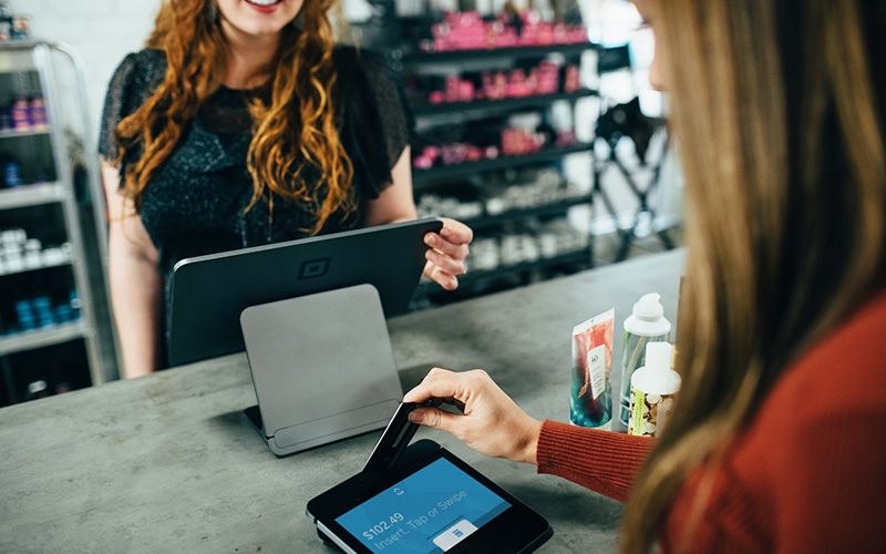 Woman paying for merchandise