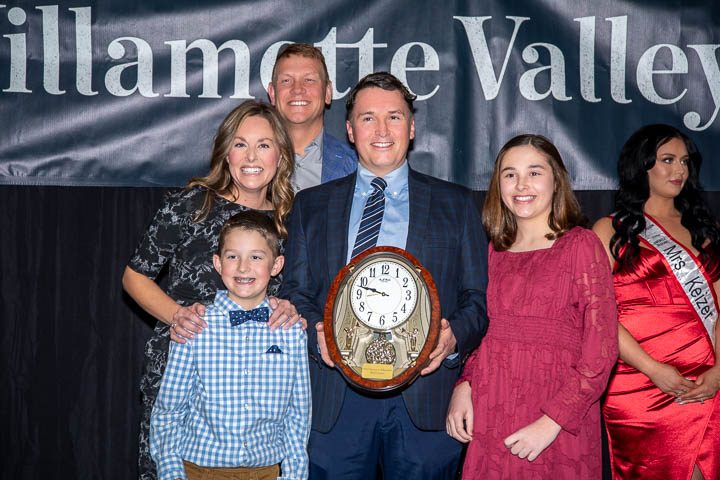 Keizer's 2023 Service to Education Award Winner, Brad Lomax, Teacher & Coach at McNary HS - with his family.